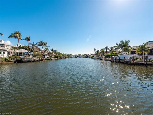 Poised to capture long, southern views of Ibis Cove, this waterfront lot located in the highly covet