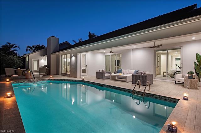 Stunning design, completely remodeled home in Park Shore. Private pool area to relax and entertain. 