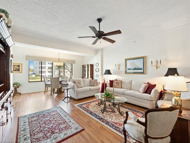 Enjoy lake views and sunset skies from this light-filled three bedroom, two bath residence on the se