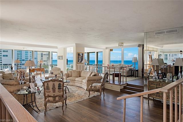 Enjoy 180-degree views of the beach, sparkling Venetian Bay and one of Park Shore's beautifully land