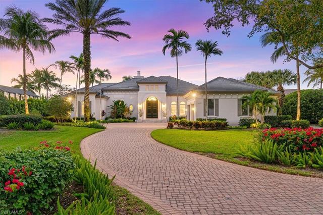 Impeccably remodeled luxury estate home at the prestigious Grey Oaks. Situated on a highly coveted l