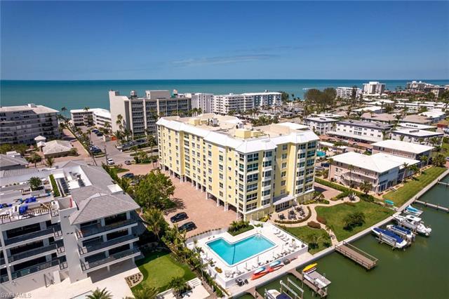 Breathtaking fully updated 2 bedroom/2 bath, 4th floor waterfront condo.  The Boulevard Club is loca