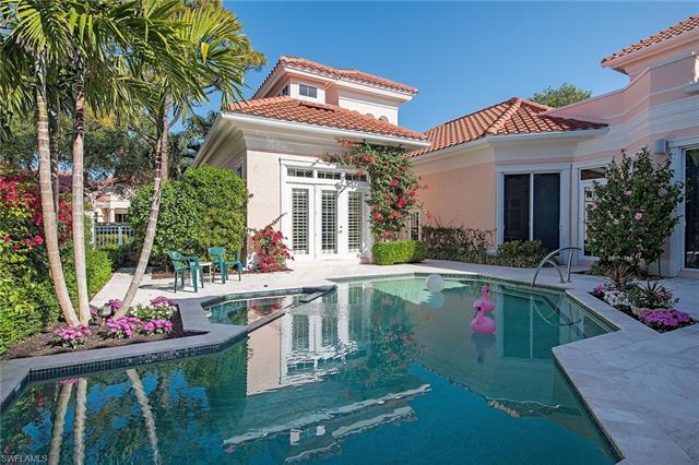 Rarely available Isle Verde courtyard home overlooking the 3rd hole of the Bay Course at Pelican Bay