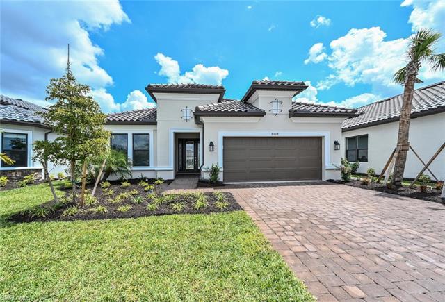 This 2023 Naples new construction, never lived in lake view home is ready to move into! The most pop