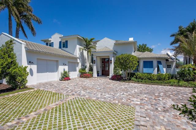 Located on a quiet cul-de-sac in prestigious Park Shore this home has been beautifully remodeled by 