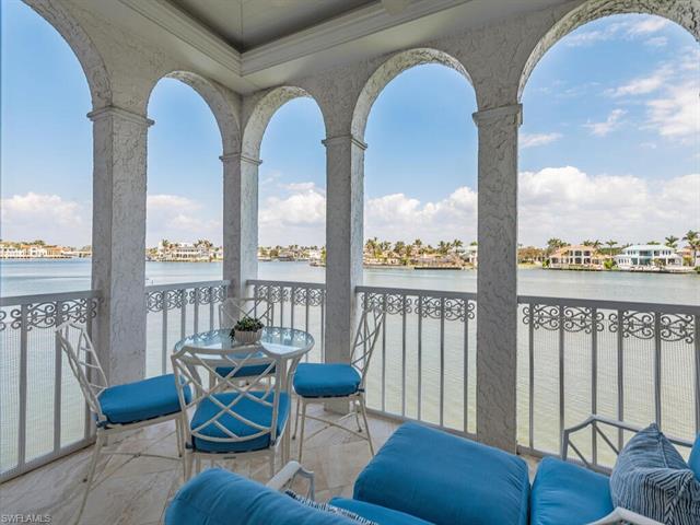 Don't miss this rare opportunity to own a Naples Landmark! Hovering over Doctor's Bay, this updated,