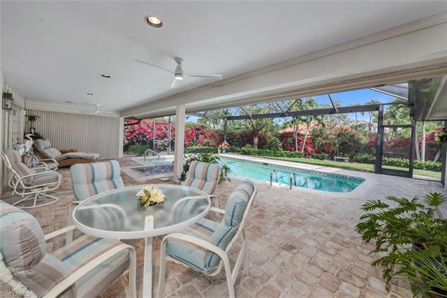 A discerning buyer will love the quiet elegance of this home in the heart of Pelican Bay. A meticulo