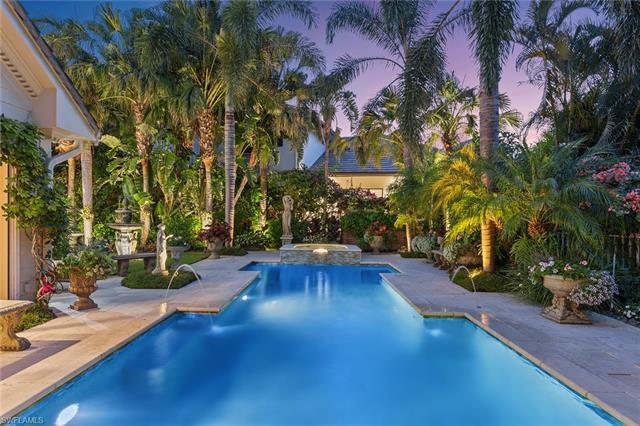 This custom-crafted, west facing home located in the pristine beach and golf community of Pelican Ba