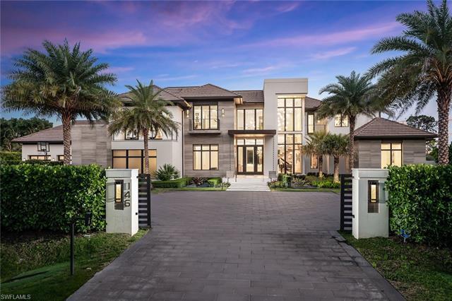 This one-of-a-kind, custom contemporary Pine Ridge estate, newly complete in 2021 features an inviti
