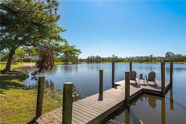 Rarely available waterfront homesite on Warbler Lake located in highly desirable Pine Ridge Estates.