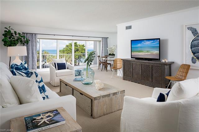 Light, bright and airy corner residence with beach-to-bay views. impeccably maintained, including im