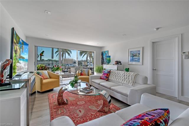Rarely available 3 bedroom corner residence at Harborside West located in the Moorings.  Recently re