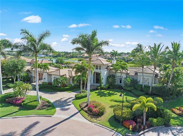 This sprawling estate home  is situated on a large lot that features privacy & long water views. 3 n