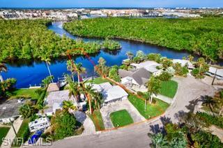 Incredible Naples Gulf Access waterfront development potential. Deeded ownership across the canal, 2