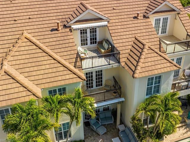 Nestled in the heart of Olde Naples, this elegant home offers a luxurious oasis just steps away from
