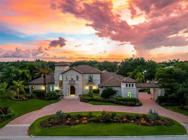 Sitting on a prime golf course lot on the 7th hole of The Lakes Course, this custom estate offers 5 