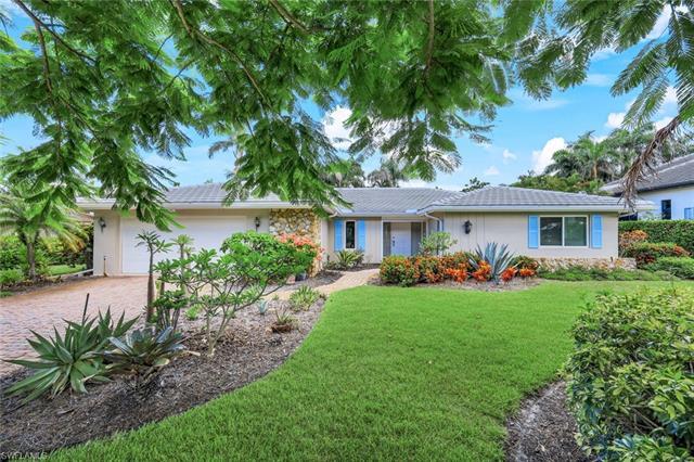 H11265. No flooding from Ian. This quintessential beach bungalow sits behind a Royal Poinciana tree in the sought after “west of 41” community of Park Shore (City of Naples). Move right in or choose to build new on this .32 acre (100x140) property w/in walking distance to the residents only (optional membership) Park Shore beach & Venetian Village’s waterfront dining/boutique shopping. As you enter this inviting home, you will notice the natural light emanating through the living room wall-to-wall sliding glass doors, w/ views of the heated pool, spa, screened lanai & tropical backyard. Lounge by the pool or relax the day away under the covered lanai. This home has a traditional floorplan with a primary bedroom, formal living, dining area, family room & two guest rooms. The kitchen has granite countertops, solid wood cabinetry, extra storage under the bar & a sliding window pass through to the lanai. The tile roof was replaced in 2017 & there are impact windows & electric hurricane shutters for peace of mind. The owner reports they did not have water intrusion during Hurricane Ian. Venetian Village, Waterside Shops, Mercato, 5th Ave and 3rd Street are just a short drive away.