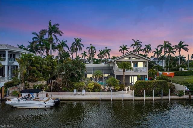 Experience the ultimate waterfront living and endless possibilities with this exceptional property l