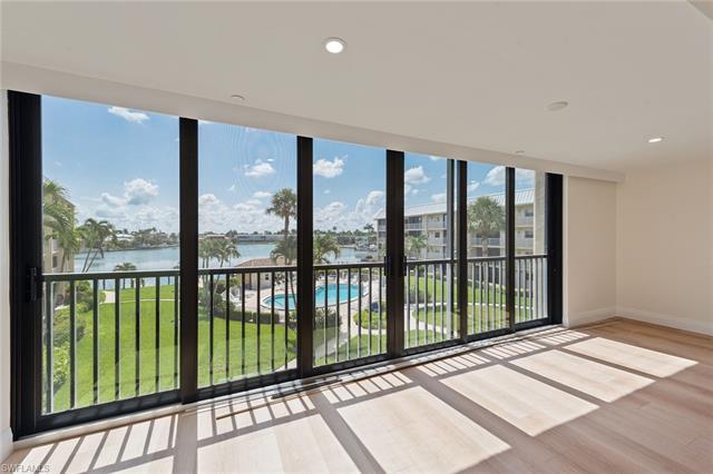 The absolutely stunning renovation was just completed in this rarely available 3-bedroom end-unit wi