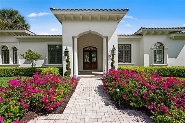 Upon entering this stunning Quail West residence, you'll be greeted by an immediate sense of opennes