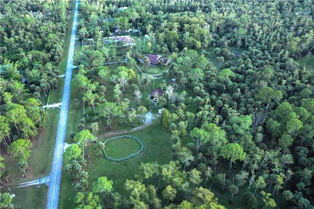 Welcome to this exceptional 10-acre horse property nestled in the heart of Naples. This meticulously