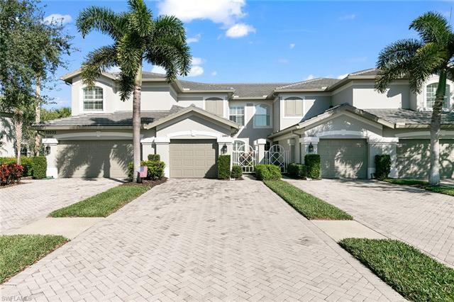 Nestled within the prestigious TwinEagles Club in Naples, FL, this elegant coach home offers an idyl