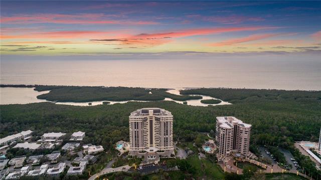 Welcome to your penthouse oasis at Grosvenor in prestigious Pelican Bay. With renovations completed 