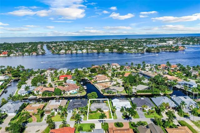 H13553 This Coastal Naples property with western exposure provides direct Gulf access with no bridge