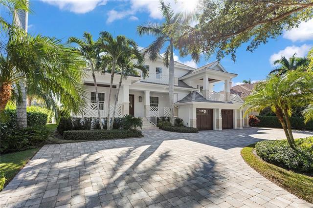 This beautiful coastal home in the heart of Old Naples sits just four blocks from the beach. The one