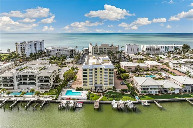 C13649 South of Doctors Pass-Walk across the street to the beach from this beautifully updated condo