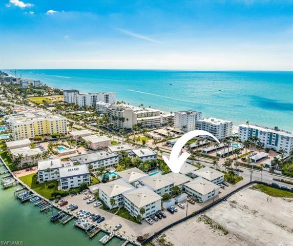 Immerse yourself in coastal living with this captivating 2-bedroom, 2-bathroom, turnkey,  condo idea