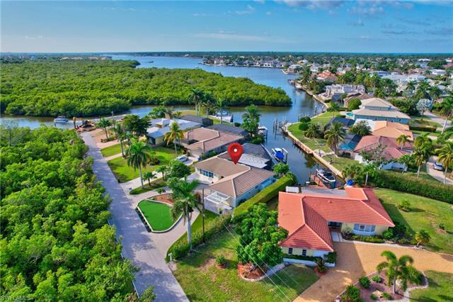 Boat, Entertain, Golf! 

Options abound from this chic coastal cottage waterfront property located