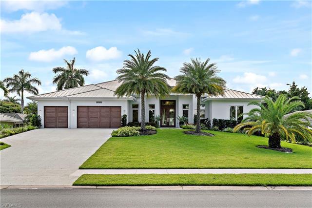 Situated in the highly sought-after Park Shore neighborhood, this stunning 2020 build offers a seaml