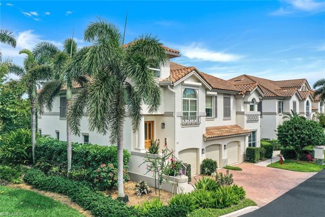 This very desirable first-floor residence is ideally located in the Colonade, a gated enclave of tre