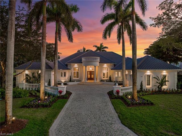 Step into an extraordinary lifestyle at this exquisitely remodeled estate on Grey Oaks' 4th fairway.