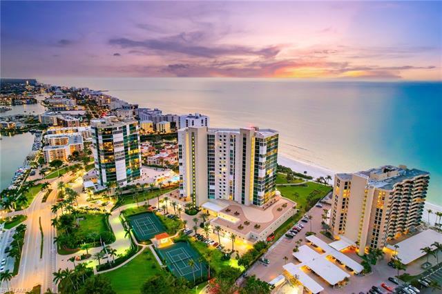 BEAUTIFULLY EXPANSIVE GULF AND BAY VIEWS abound from this 10th floor Park Shore stunner. Bright and 