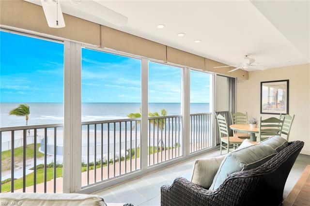 LOWEST PRICED 3 BEDROOM 3 BATH UNIT IN REGENCY TOWERS.  Located directly on Naples beach this 3rd fl