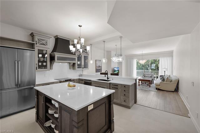 The completely remodeled luxury condo in Breakwater in the Pelican Bay community is a stunning 3-bed
