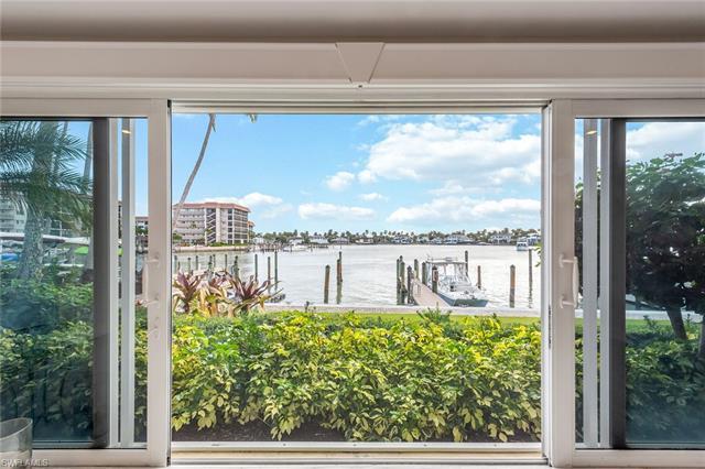 This fully remodeled first-floor villa features front-row views of Moorings Bay and allows 2 pets
w