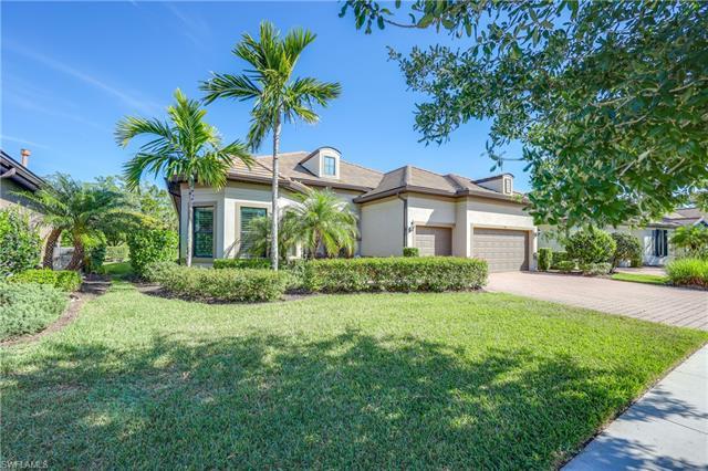 Welcome to your dream home in the heart of Naples, Florida's coveted Winding Cypress community, wher