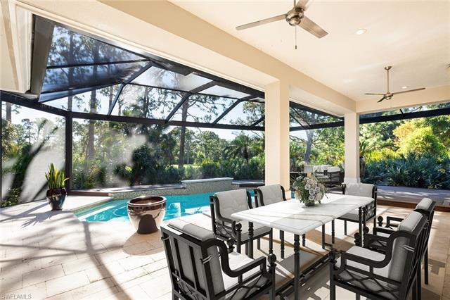 Picturesque golf course views in the heart of Collier’s Reserve is the signature of this extremely p