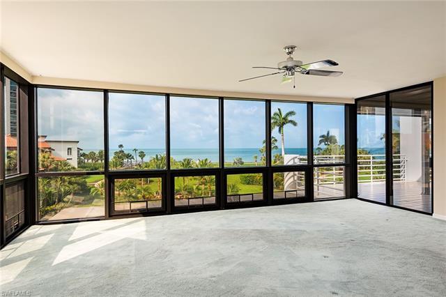Breathtaking views of the gulf from the moment you enter this rarely available three-bedroom residen