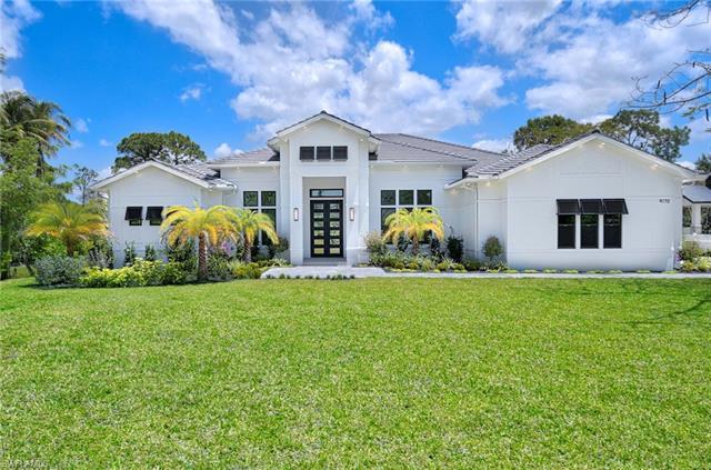 Now ready for occupancy! Rare opportunity secluded in Quail Woods Estates in North Naples. This BRAN