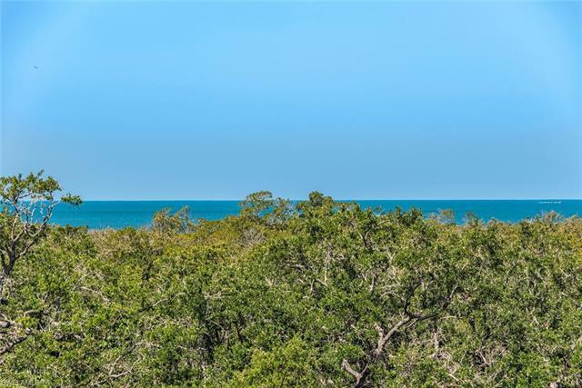 This lovely 2 Bedroom + Den, 2-Bath residence offers sublime GULF and mangrove VIEWS, setting the st