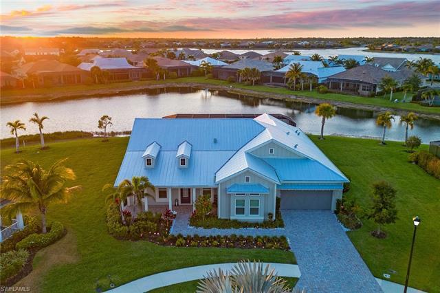 Welcome to the epitome of Florida living! This stunning waterfront, open-concept home, rests on an o