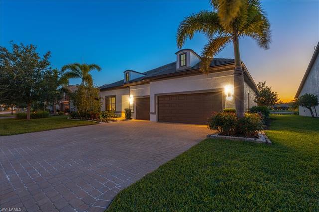 Introducing a stunning home for sale in the prestigious Winding Cypress community of Naples, Florida