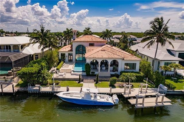 Welcome to "The Gateway to Naples Bay." This one of a kind property is located on an estate size lot