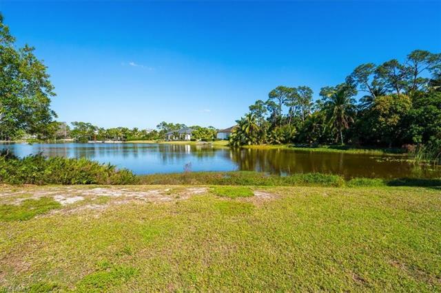 Welcome to your own 1.24 acre sanctuary, situated on Egret lake in the highly sought out neighborhoo