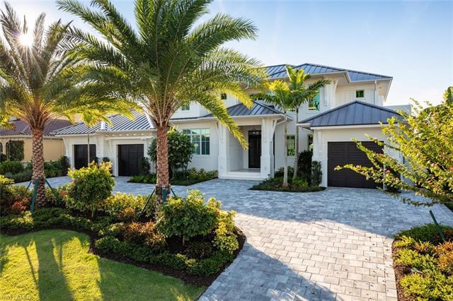 A unique opportunity to live in this stunning newly constructed Aqualane Shores waterfront home in t