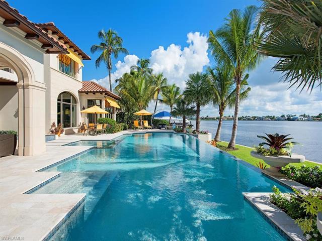 Experience the ultimate in Naples waterfront living at Vista Point Estate of Aqualane Shores. Locate